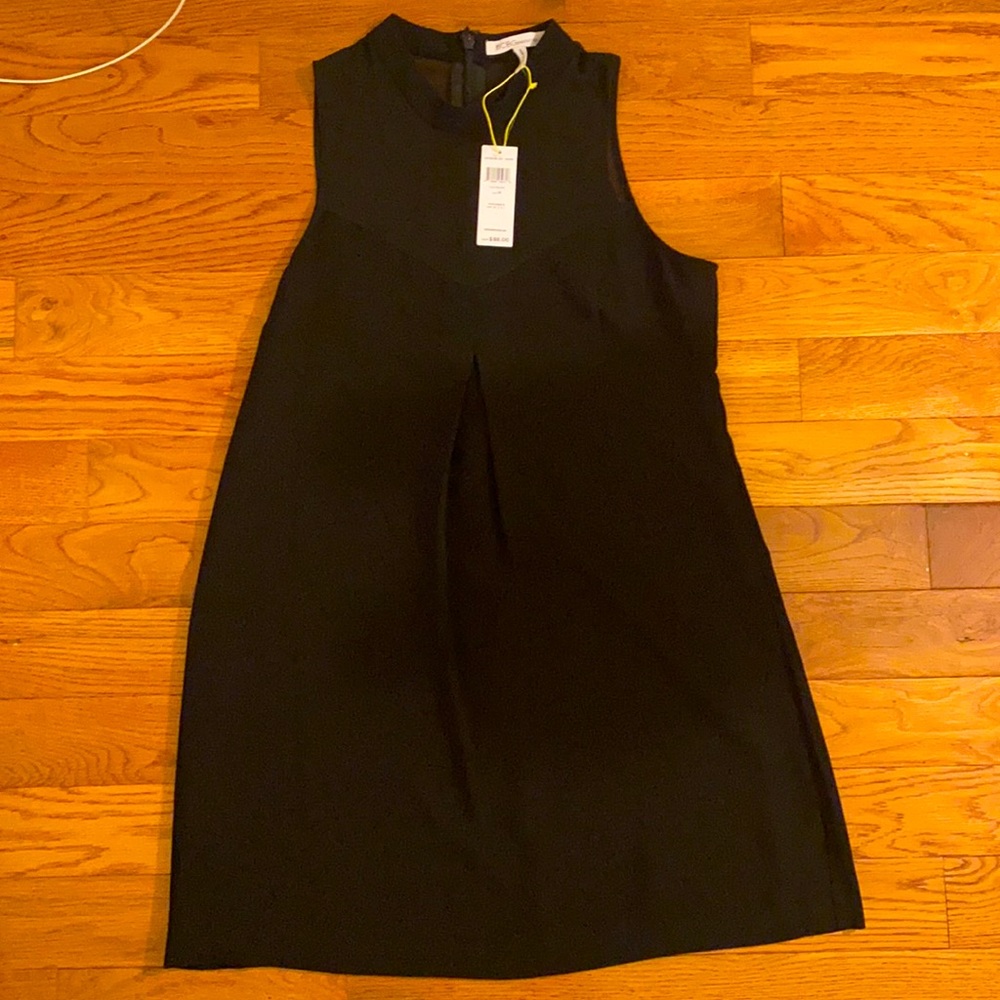 New with tags! BCBG Black dress! V neck chiffon top detail!